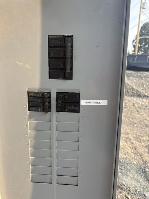 Main disconnect panel labeled for a mobile home service